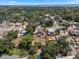 Property outlined in red showing the home, backyard, and lush green neighborhood at 378 W Osceola St, Clermont, FL 34711