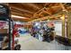 Unfinished basement space with wooden ceiling, a concrete floor, and ample storage at 378 W Osceola St, Clermont, FL 34711
