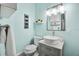 Stylish half bathroom with modern vessel sink, updated fixtures, and marine themed decor at 378 W Osceola St, Clermont, FL 34711