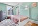 bedroom with decorative rug and bed at 378 W Osceola St, Clermont, FL 34711