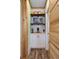Charming coffee bar with white cabinets, open wood shelving, and microwave at 378 W Osceola St, Clermont, FL 34711