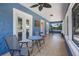 Inviting front porch with ample seating and views of the neighborhood at 378 W Osceola St, Clermont, FL 34711