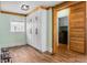 Hallway with built in cabinetry, wood accents and washer and dryer at 378 W Osceola St, Clermont, FL 34711