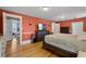 Spacious main bedroom with hardwood floors, large windows, and ample closet space at 378 W Osceola St, Clermont, FL 34711
