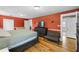 Spacious main bedroom with hardwood floors, large windows, and ample closet space at 378 W Osceola St, Clermont, FL 34711