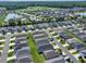 A neighborhood featuring a lake, golf course and multiple single Gathering homes at 3817 Miragalia Ln, The Villages, FL 32163
