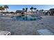 A refreshing community pool surrounded by lounge chairs, perfect for relaxation and socializing at 3817 Miragalia Ln, The Villages, FL 32163