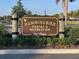 Hummingbird Postal & Recreation community sign in The Villages, with lush landscaping around the base at 3817 Miragalia Ln, The Villages, FL 32163