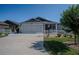 Beautiful home with a two-car garage, screened porch, and lovely landscaping at 3817 Miragalia Ln, The Villages, FL 32163