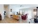 Bright living room featuring modern flooring and abundant natural light at 3817 Miragalia Ln, The Villages, FL 32163
