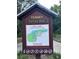 Informative Fenney Nature Trail sign with map and details about the trail amenities at 3817 Miragalia Ln, The Villages, FL 32163