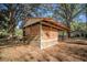 Outdoor structure of barn provides secure shelter and animal comfort on the property's grounds at 3930 Griffin Ave, Lady Lake, FL 32159