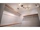 Spacious closet with ample shelving and lighting at 3930 Griffin Ave, Lady Lake, FL 32159