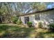This home boasts a private entrance, serene outdoor space, and sliding door access to the residence at 3930 Griffin Ave, Lady Lake, FL 32159