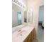 Bathroom vanity with sink and mirror at 3969 Derby Glen Dr, Clermont, FL 34711