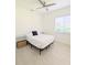 Bright bedroom with a ceiling fan, a bed, and a window with blinds at 3969 Derby Glen Dr, Clermont, FL 34711