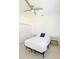 Bright bedroom with ceiling fan, bed, side tables and closet at 3969 Derby Glen Dr, Clermont, FL 34711