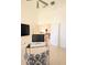 Home office with white walls, tiled floors, and an open view into other rooms at 3969 Derby Glen Dr, Clermont, FL 34711