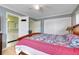 Comfortable bedroom with ensuite bathroom and large closet offers privacy at 410 E Gulley Ave, Oakland, FL 34760