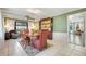 Dining room with seating for six, views to a back yard and bonus seating area at 410 E Gulley Ave, Oakland, FL 34760