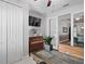 A bonus room features a piano, TV, closet space and an interior view to the dining area at 440 Bellissimo Pl, Howey In The Hills, FL 34737