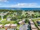 Stunning aerial view of community, showcasing the beautiful lake and surrounding nature at 500 Newell Hill Rd # 113D, Leesburg, FL 34748