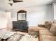 Inviting living room with hardwood floors, a comfortable couch, and stylish furnishings at 500 Newell Hill Rd # 113D, Leesburg, FL 34748