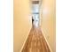 Hallway with hardwood flooring and natural light at 5051 Nw 61St Ct, Ocala, FL 34482