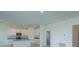 Bright, airy kitchen featuring stainless appliances, granite counters, and kitchen island at 520 Silver Palm Dr, Haines City, FL 33844