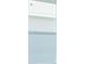 Close-up of a single hung window with white trim at 520 Silver Palm Dr, Haines City, FL 33844