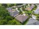 Aerial shot showcasing the rooftops of a home and neighboring properties in a well-kept community at 541 Cokesbury Dr, The Villages, FL 32162