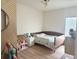 Cozy bedroom features a unique accent wall and charming decor at 591 Black Eagle Dr, Groveland, FL 34736