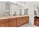 Bright bathroom featuring double sinks, spacious countertop, and modern fixtures at 6048 Topsail Rd, Lady Lake, FL 32159