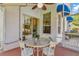 Serene screened patio with an outdoor dining area perfect for relaxing at 6048 Topsail Rd, Lady Lake, FL 32159