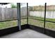 View of the screened in back porch at 610 Swallow Ct, Apopka, FL 32712