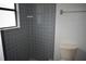 Full bathroom featuring tiled shower at 610 Swallow Ct, Apopka, FL 32712