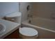 Bathroom with a bathtub and commode at 610 Swallow Ct, Apopka, FL 32712
