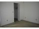 Neutral bedroom offering closet space and carpet floors at 610 Swallow Ct, Apopka, FL 32712