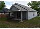 Exterior of home with siding and screened in back porch at 610 Swallow Ct, Apopka, FL 32712