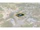 Aerial view of a beautiful home in a suburban setting, highlighted in a yellow box at 6221 Ambassador Dr, Orlando, FL 32808