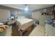 Cozy bedroom with carpet flooring, storage bed frame, and modern gray furniture at 6221 Ambassador Dr, Orlando, FL 32808