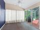 Bright sunroom with large sliding glass doors to the outside at 628 San Pedro Dr, The Villages, FL 32159