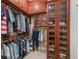 Large walk-in closet with custom shelves and storage space at 654 Poinsett Ct, The Villages, FL 32162