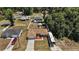 Aerial view of the home showcasing the manicured landscaping and RV parking at 7162 Se 124Th St, Belleview, FL 34420