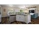 Modern kitchen with granite countertops, stainless steel appliances, and open concept design at 7162 Se 124Th St, Belleview, FL 34420