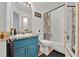 Bathroom featuring a vanity with mosaic tile and a shower with tub combination at 802 Balmoral Dr, Davenport, FL 33896