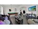 Inviting game room with a pool table, TV, and cozy seating area for entertainment at 802 Balmoral Dr, Davenport, FL 33896