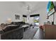 Spacious living room features a ceiling fan and sliding glass doors leading to the outside at 802 Balmoral Dr, Davenport, FL 33896