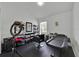 Office space with ample room for beauty setup and a window providing natural light at 802 Balmoral Dr, Davenport, FL 33896
