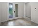 Bright foyer features tiled floors and decorative glass double doors, offering an inviting entry at 9220 San Jose Blvd, Howey In The Hills, FL 34737